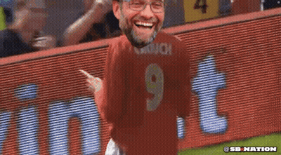 Man In Red Jersey Number 9 Laughing GIF