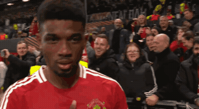 Man In Red Jersey Saying Manchester GIF