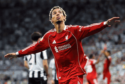 Man In Red Jersey Saying Standard Chartered GIF