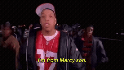 Man In Red Jersey Talking To Crowd GIF