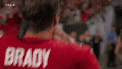 Man In Red Jersey With Brady On Back GIF