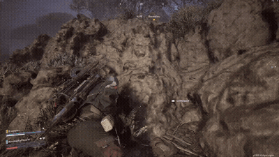 Man In Red Jumpsuit Holding Rifle GIF