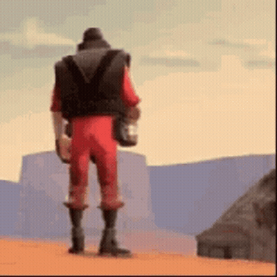 Man In Red Jumpsuit Holding Water In Desert GIF