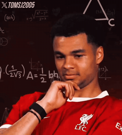 Man In Red LFC Jersey In Front Of Blackboard GIF