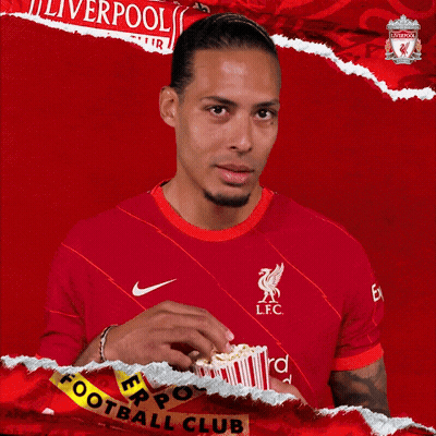 Man In Red Liverpool Jersey Eating Popcorn GIF