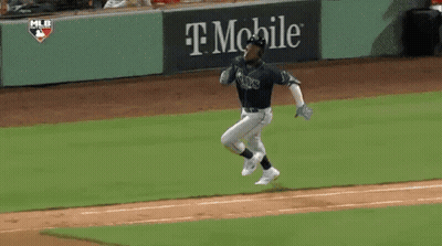 Man In Red Mexico Jersey Standing In Front Of Fence GIF