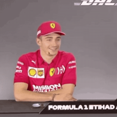 Man In Red Mission Shirt Smiling GIF