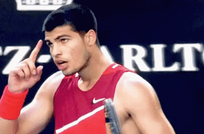 Man In Red Nike Tank Top Pointing Up GIF