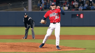 Man In Red Ole Miss Baseball Jersey In Front Of Crowd GIF