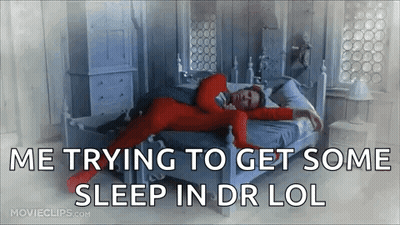 Man In Red Pajamas Trying To Sleep GIF