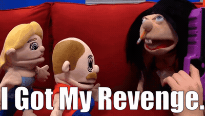 Man In Red Pants Dancing On Stage In Front Of Gold Curtain GIF