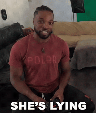 Man In Red Polo Shirt Saying She's Lying GIF