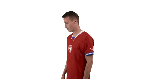 Man In Red Puma Shirt With Lion Sticker