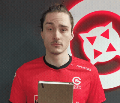 Man In Red Randstad Shirt Holding Notebook GIF