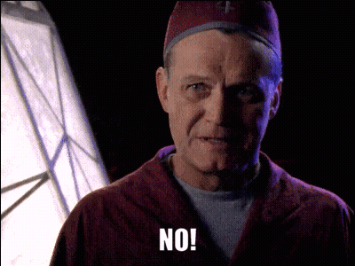 Man In Red Robe And Hat Saying No GIF