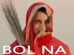Man In Red Robe Holding Broom GIF