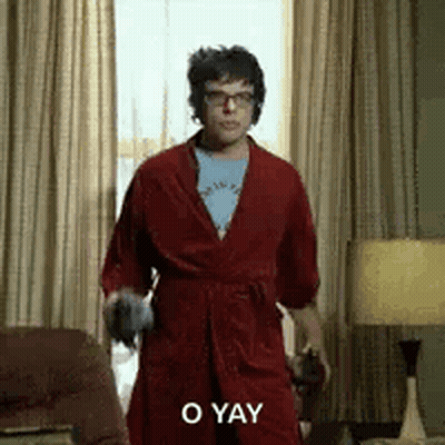 Man In Red Robe Holding Glasses GIF
