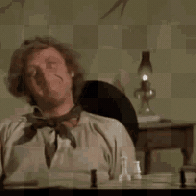 Man In Red Robe Next To Man In Black Robe GIF