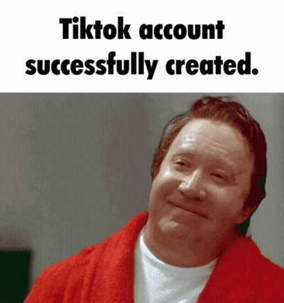Man In Red Robe Smiling TikTok Account Successfully Created GIF