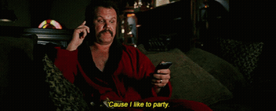 Man In Red Robe Talking On Phone GIF