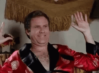 Man In Red Robe Waving GIF