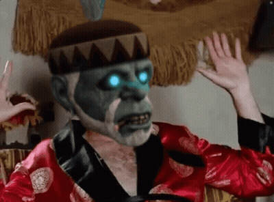 Man In Red Robe With Crown And Blue Eyes GIF