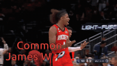 Man In Red Rockets Jersey On Basketball Court GIF
