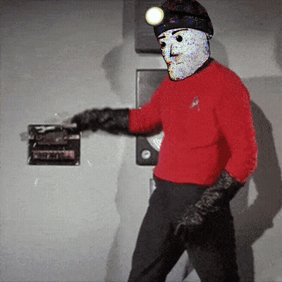 Man In Red Shirt And Black Gloves Beside Emergency Exit Sign GIF