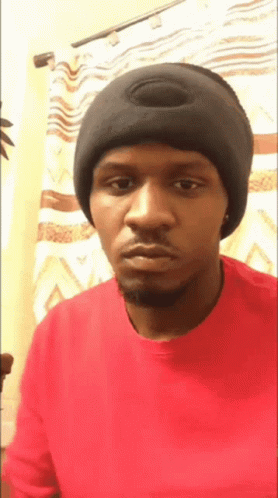 Man In Red Shirt And Black Hat GIF