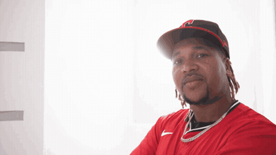 Man In Red Shirt And Black Hat With H GIF