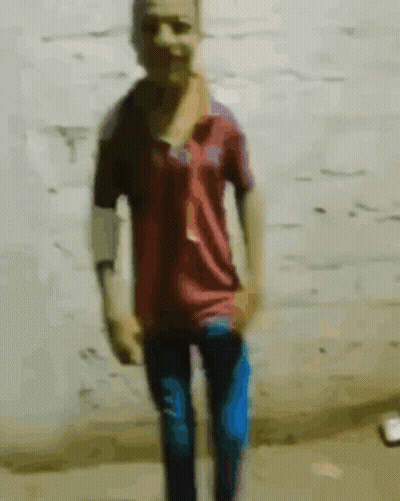 Man In Red Shirt And Blue Jeans GIF