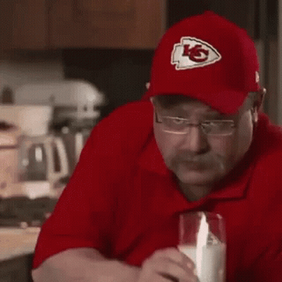 Man In Red Shirt And Hat Drinking Milk GIF