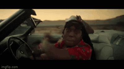 Man In Red Shirt And Hat Driving Car GIF