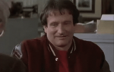 Man In Red Shirt And Jacket Smiling GIF