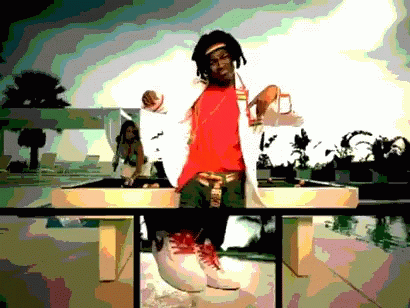 Man In Red Shirt And White Jacket On Table GIF