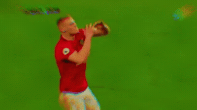 Man In Red Shirt And White Shorts Holding Soccer Ball GIF