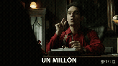 Man In Red Shirt At Desk With Netflix Logo GIF