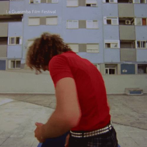Man In Red Shirt At La Guarimba Film Festival GIF
