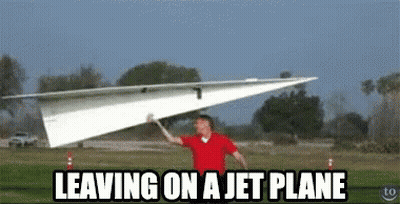 Man In Red Shirt Carrying Paper Airplane Leaving On A Jet Plane GIF