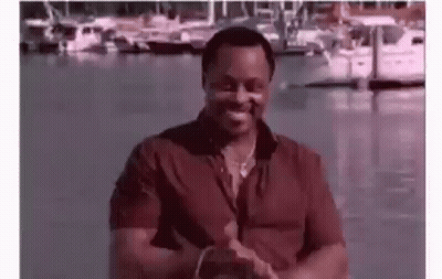 Man In Red Shirt Clapping At Marina GIF