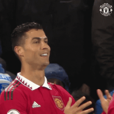 Man In Red Shirt Clapping In Stadium GIF