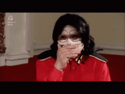 Man In Red Shirt Covering Mouth GIF