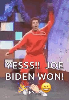 Man In Red Shirt Dancing And Saying Joe Biden Won GIF