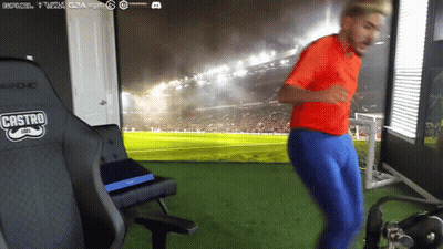 Man In Red Shirt Dancing In Front Of Castro Chair GIF