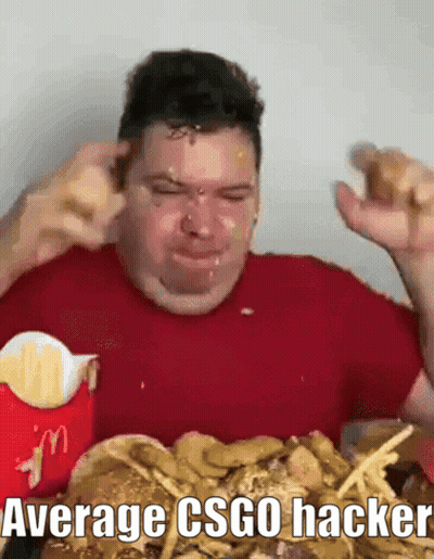 Man In Red Shirt Eating Hamburger Saying Average CSGO Hacker GIF