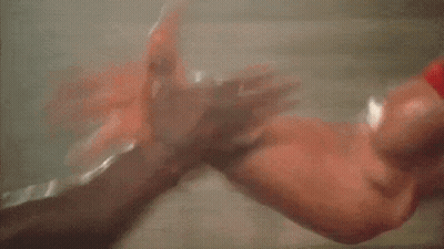 Man In Red Shirt Flexing Muscles GIF