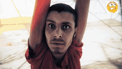 Man In Red Shirt Hanging Upside Down Arms In Air GIF