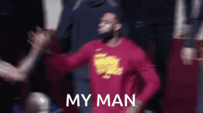 Man In Red Shirt High-Fiving Another Man GIF