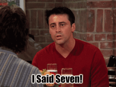 Man In Red Shirt Holding Beer Says I Said Seven GIF
