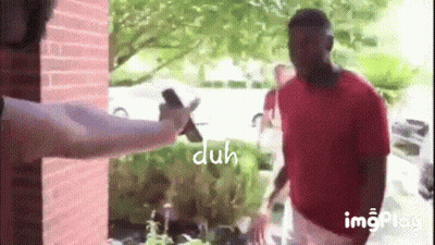 Man In Red Shirt Holding Cell Phone GIF